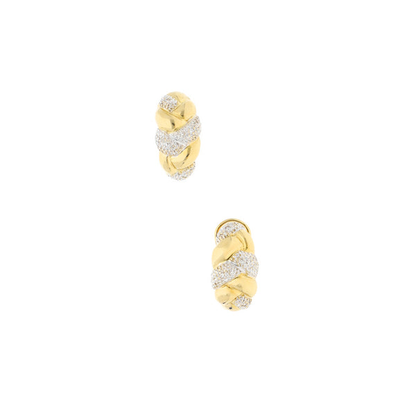 Aretes diseño especial con diamantes en oro amarillo 18 kilates.