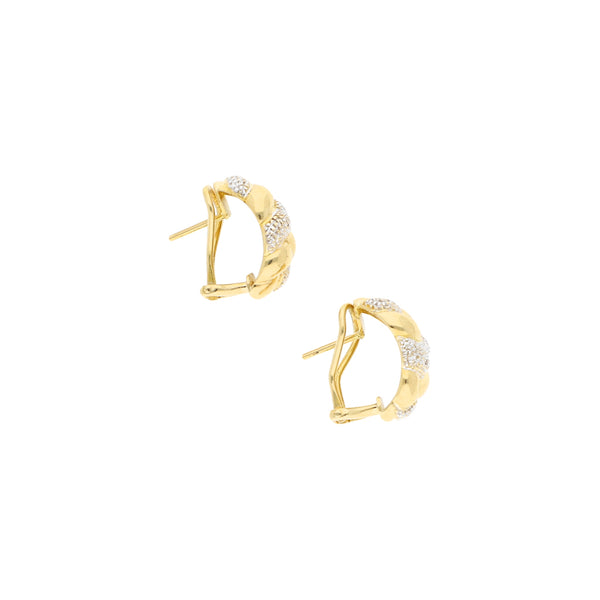 Aretes diseño especial con diamantes en oro amarillo 18 kilates.