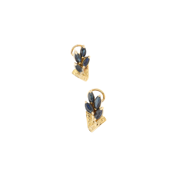 Aretes diseño especial con zafiros en oro amarillo 14 kilates.