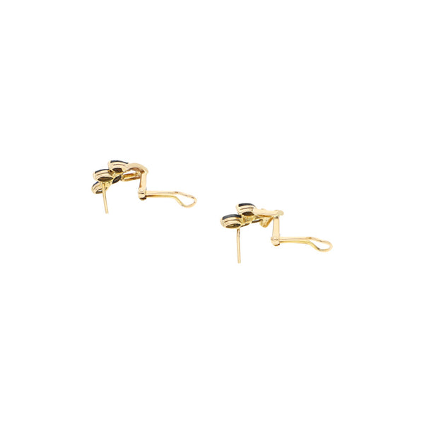 Aretes diseño especial con zafiros en oro amarillo 14 kilates.