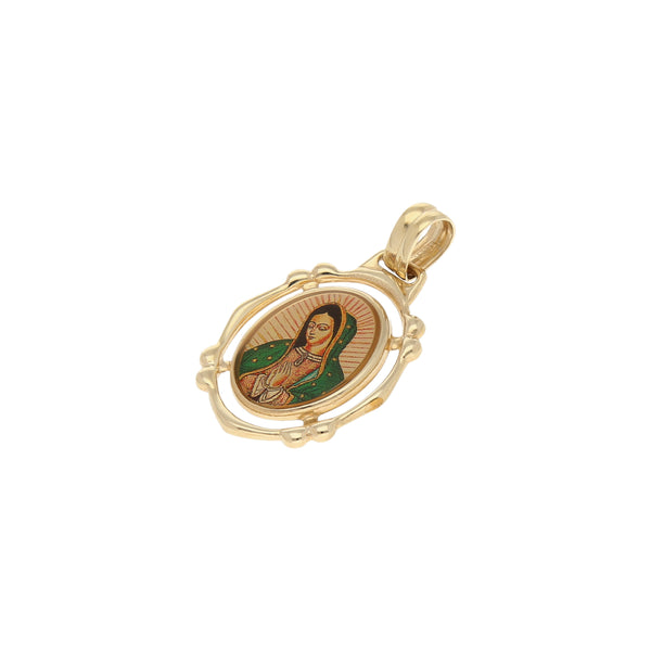 Medalla calada motivo Virgen de Guadalupe con esmalte en oro amarillo 14 kilates.