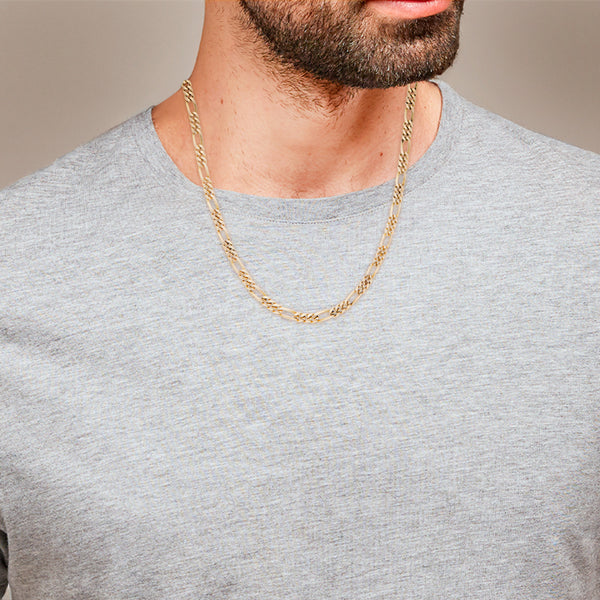 Collar de tres eslabones por uno en oro amarillo 18 kilates.