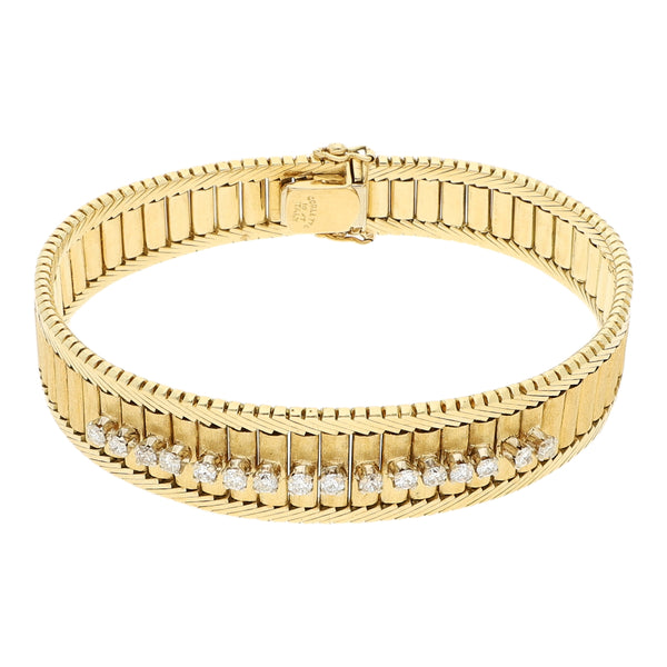 Pulsera eslabón articulado con diamantes en oro amarillo 18 kilates.