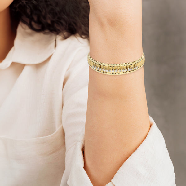 Pulsera eslabón articulado con diamantes en oro amarillo 18 kilates.