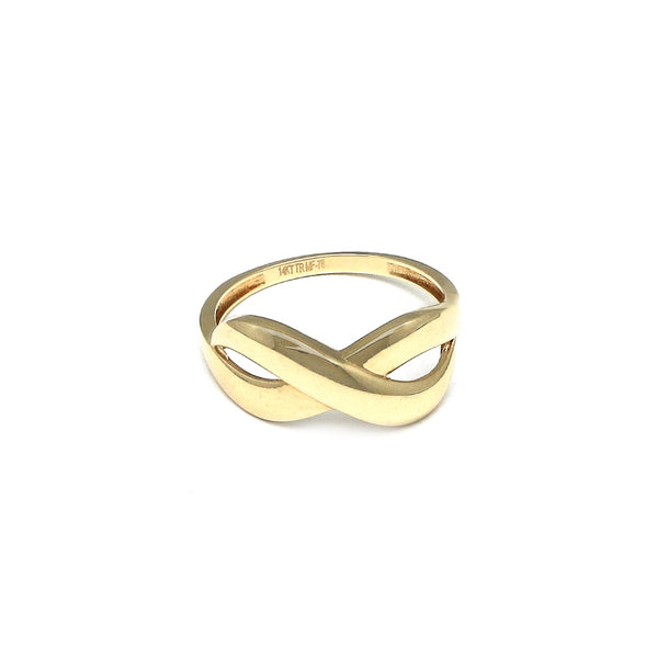 Anillo ondulado motivo infinito en oro amarillo 14 kilates.