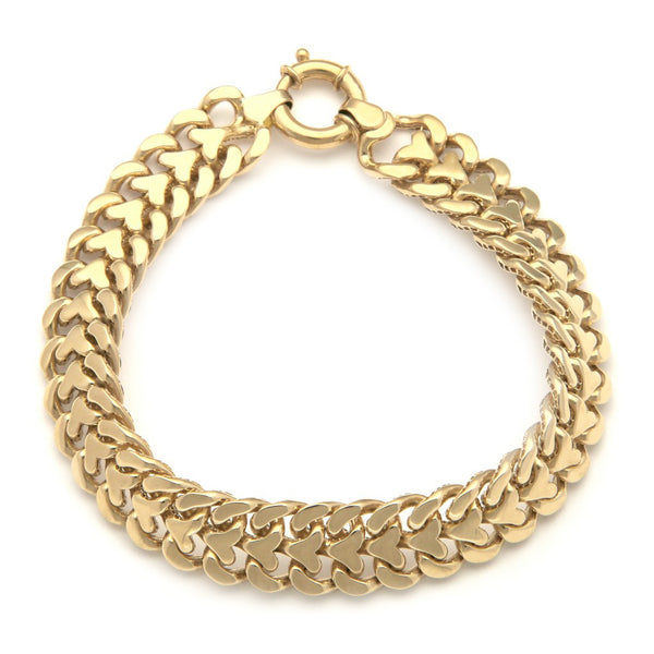 Pulsera eslabón calado motivo corazón en oro amarillo 14 kilates.