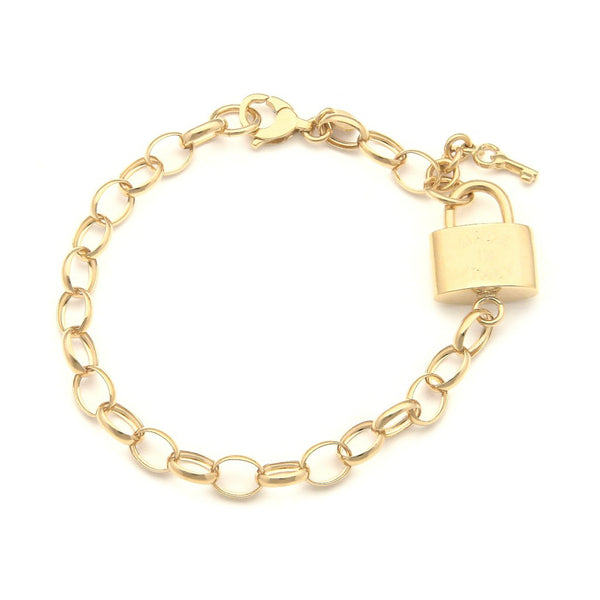 Pulsera eslabón cruzado con aplicación y colgante motivo candado y llave en oro amarillo 14 kilates.