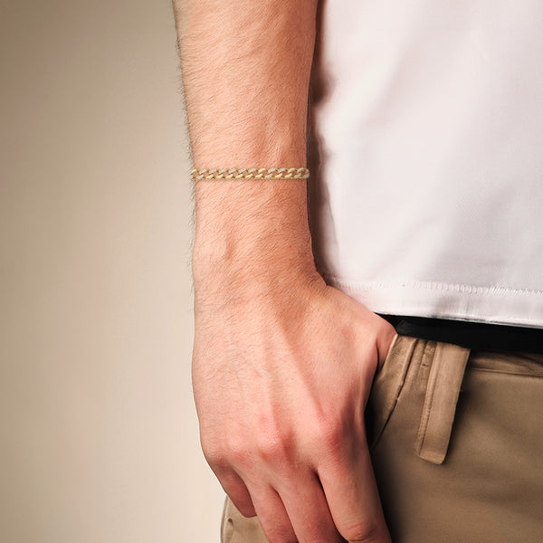 Pulsera eslabón encontrado con circonias en oro amarillo 14 kilates.