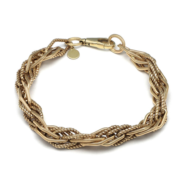 Pulsera eslabón tejido oro amarillo 14 kilates.