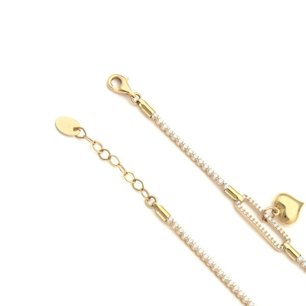 Pulsera eslabón articulado con colgante motivo corazón y circonias en oro amarillo 14 kilates.