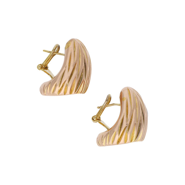 Aretes huecos en oro dos tonos 14 kilates.