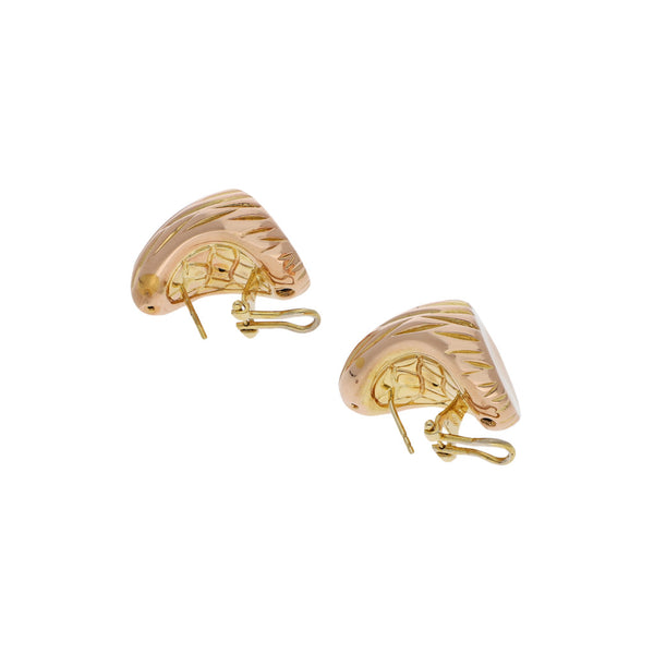 Aretes huecos en oro dos tonos 14 kilates.