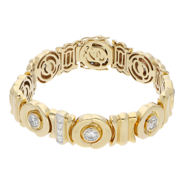 Pulsera eslabón articulado con diamantes en oro amarillo 14 kilates.