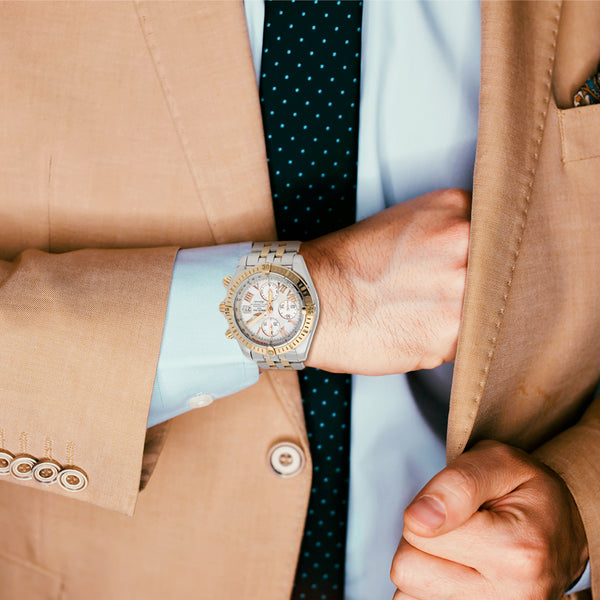 Reloj Breitling para caballero modelo Chronomat Evolution vistas oro amarillo 18 kilates.