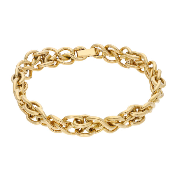 Pulsera eslabón combinado firma Tane en oro amarillo 18 kilates.