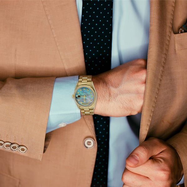 Reloj Rolex para caballero modelo Oyster Perpetual Day-Date en oro amarillo 18 kilates.