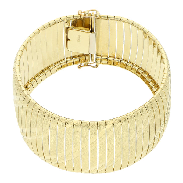 Pulsera eslabón laminado en oro amarillo 14 kilates.