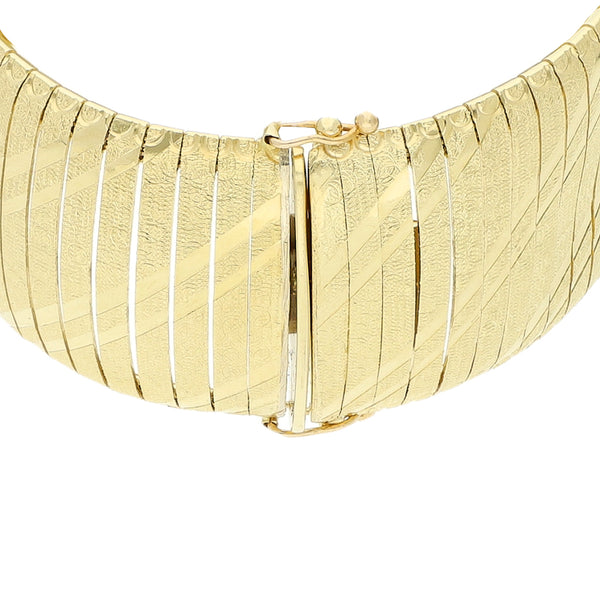 Pulsera eslabón laminado en oro amarillo 14 kilates.