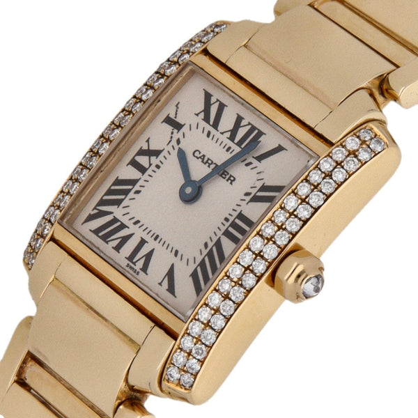 Reloj Cartier para dama modelo Tank Française en oro amarillo 18 kilates.