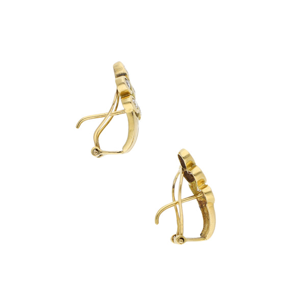 Aretes diseño especial con sinteticos en oro amarillo 18 kilates.