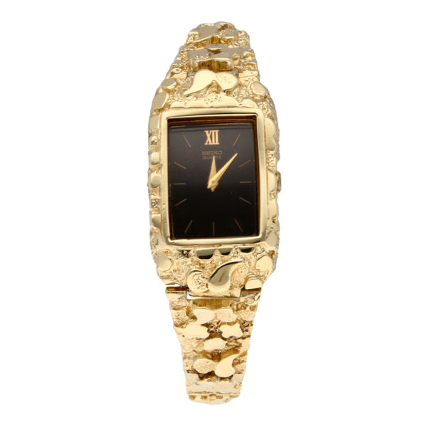 Reloj Seiko para dama modelo 2C205830 pulso y bisel oro amarillo 14 kilates.