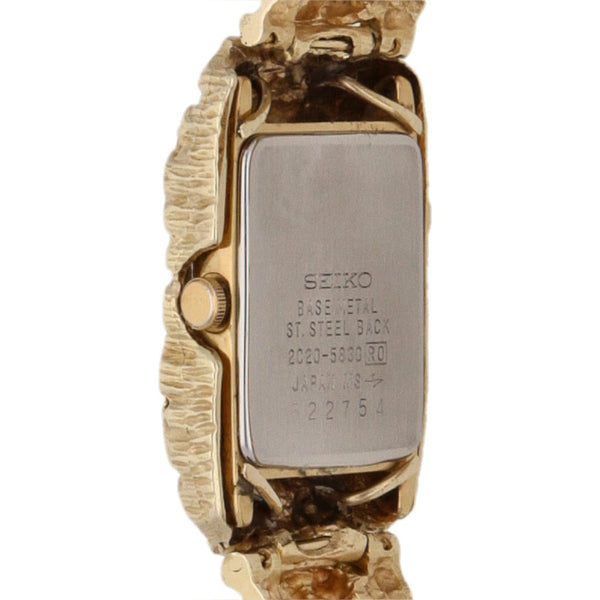 Reloj Seiko para dama modelo 2C205830 pulso y bisel oro amarillo 14 kilates.