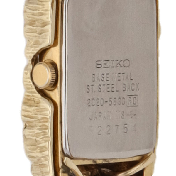 Reloj Seiko para dama modelo 2C205830 pulso y bisel oro amarillo 14 kilates.