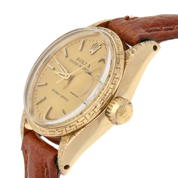 Reloj Rolex para dama modelo Oyster Perpetual caja oro amarillo 18 kilates.