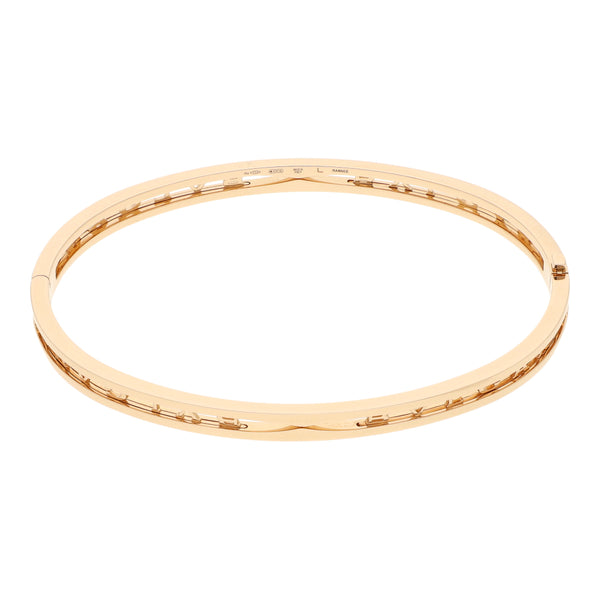 Pulsera de arillo articulada firma Bvlgari en oro rosa 18 kilates.