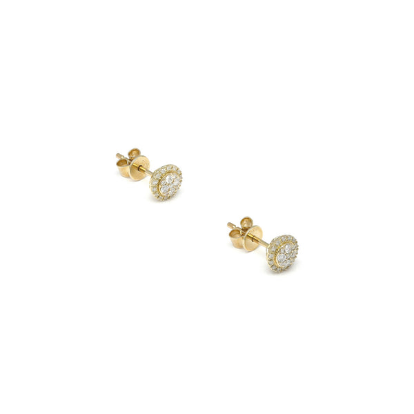 Aretes diseño especial con diamantes en oro amarillo 14 kilates.