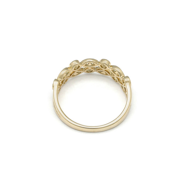 Anillo diseño especial con diamantes en oro amarillo 14 kilates.