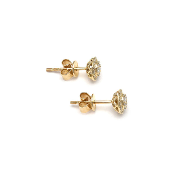 Aretes diseño especial con diamantes en oro amarillo 14 kilates.