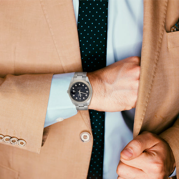 Reloj Rolex para caballero modelo Oyster Perpetual DateJust bisel en oro blanco 18 kilates.