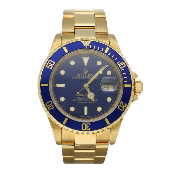 Reloj Rolex para caballero modelo Oyster Perpetual Date Submariner en oro amarillo 18 kilates.