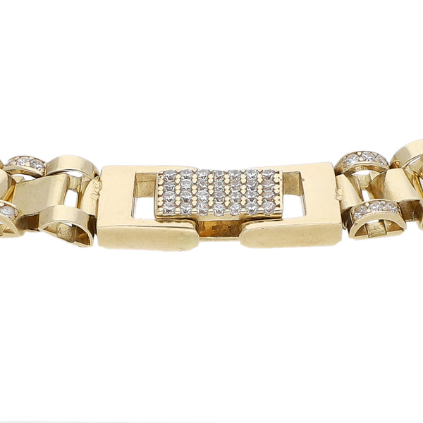 Pulsera eslabón articulado con sintéticos en oro amarillo 14 kilates.