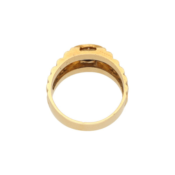 Anillo diseño especial con diamantes y sintéticos en oro amarillo 18 kilates.