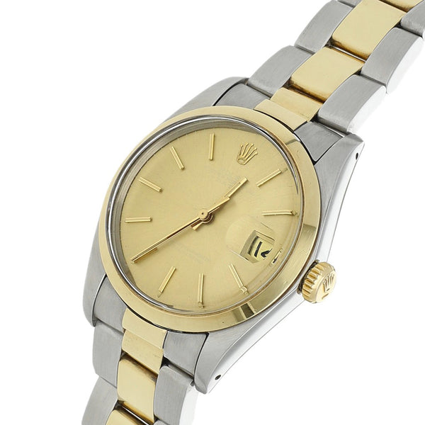 Reloj Rolex para caballero modelo Oyster Perpetual Date vistas en oro amarillo 14 kilates.