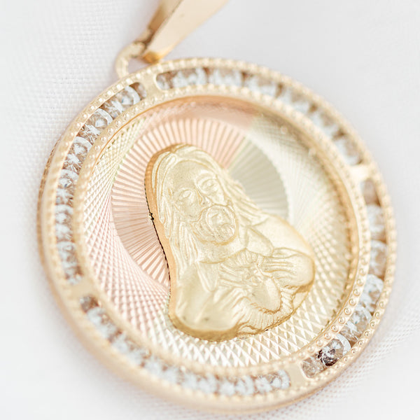 Medalla diseño especial con sintéticos motivo Sagrado Corazón de Jesús en oro amarillo 14 kilates.