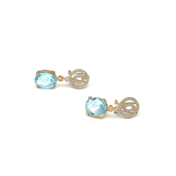 Aretes diseño especial con Sky blue y sintéticos en oro amarillo 14 kilates.