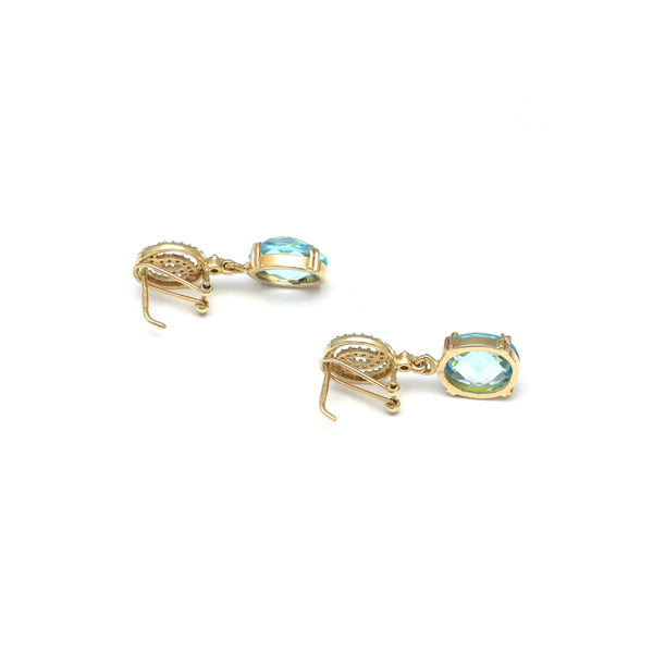 Aretes diseño especial con Sky blue y sintéticos en oro amarillo 14 kilates.