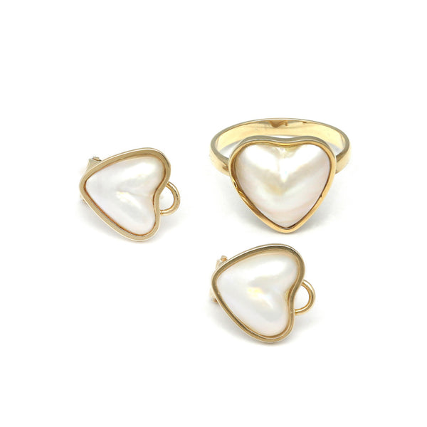 Juego de anillo y aretes diseño especial motivo corazón con media perla en oro amarillo 14 kilates.