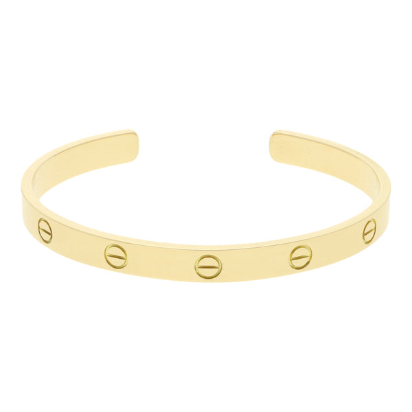 Pulsera de arillo abierta firma Cartier en oro amarillo 18 kilates.