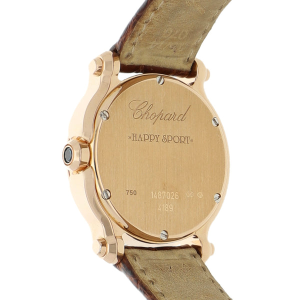 Reloj Chopard para dama modelo Happy Sport caja y broche en oro rosa 18 kilates.