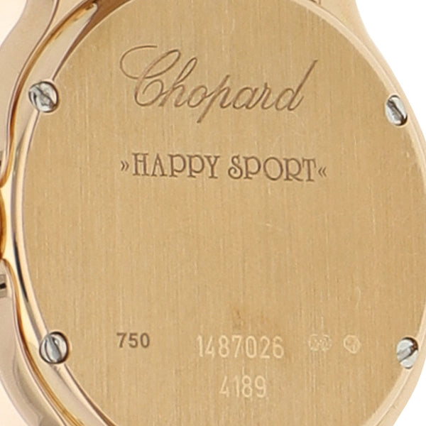 Reloj Chopard para dama modelo Happy Sport caja y broche en oro rosa 18 kilates.