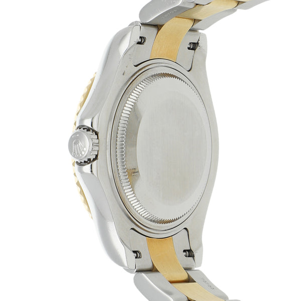 Reloj Rolex para dama/unisex modelo Oyster Perpetual Date Yacht Master vistas en oro amarillo 18 kilates.