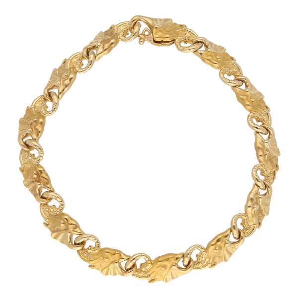 Pulsera eslabón articulado motivo elefantes firma Carrera y Carrera en oro amarillo 18 kilates.