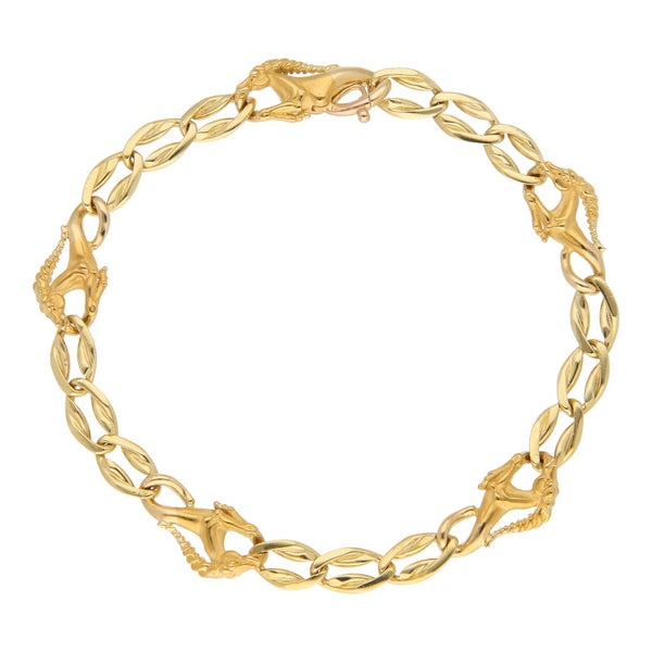 Pulsera eslabón combinado motivo unicornios firma Carrera y Carrera en oro amarillo 18 kilates.