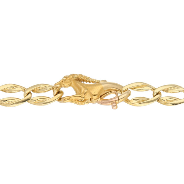 Pulsera eslabón combinado motivo unicornios firma Carrera y Carrera en oro amarillo 18 kilates.