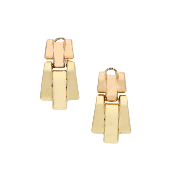 Aretes huecos en oro dos tonos 14 kilates.