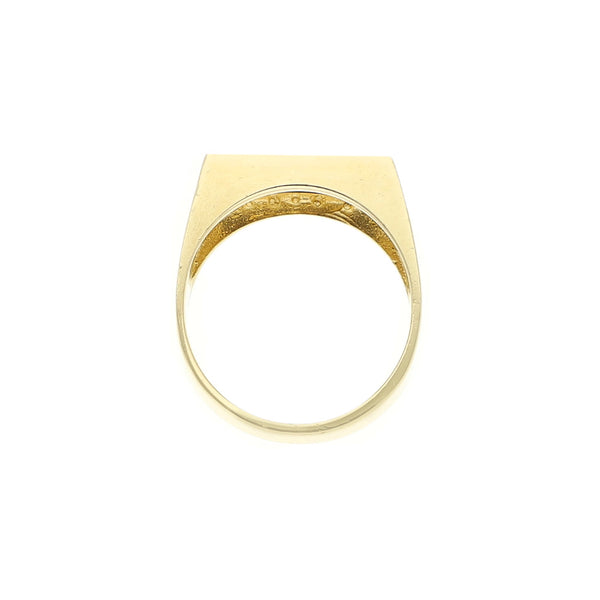 Anillo tipo sello con ónix en oro amarillo 14 kilates.